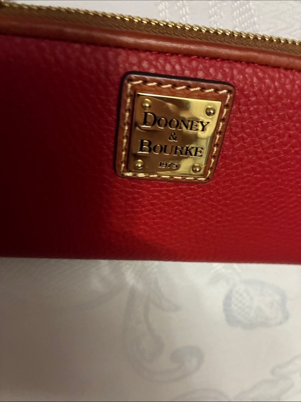 Dooney & Bourke Red Pebbled Leather Cosmetic Pouch with Gold Plaque